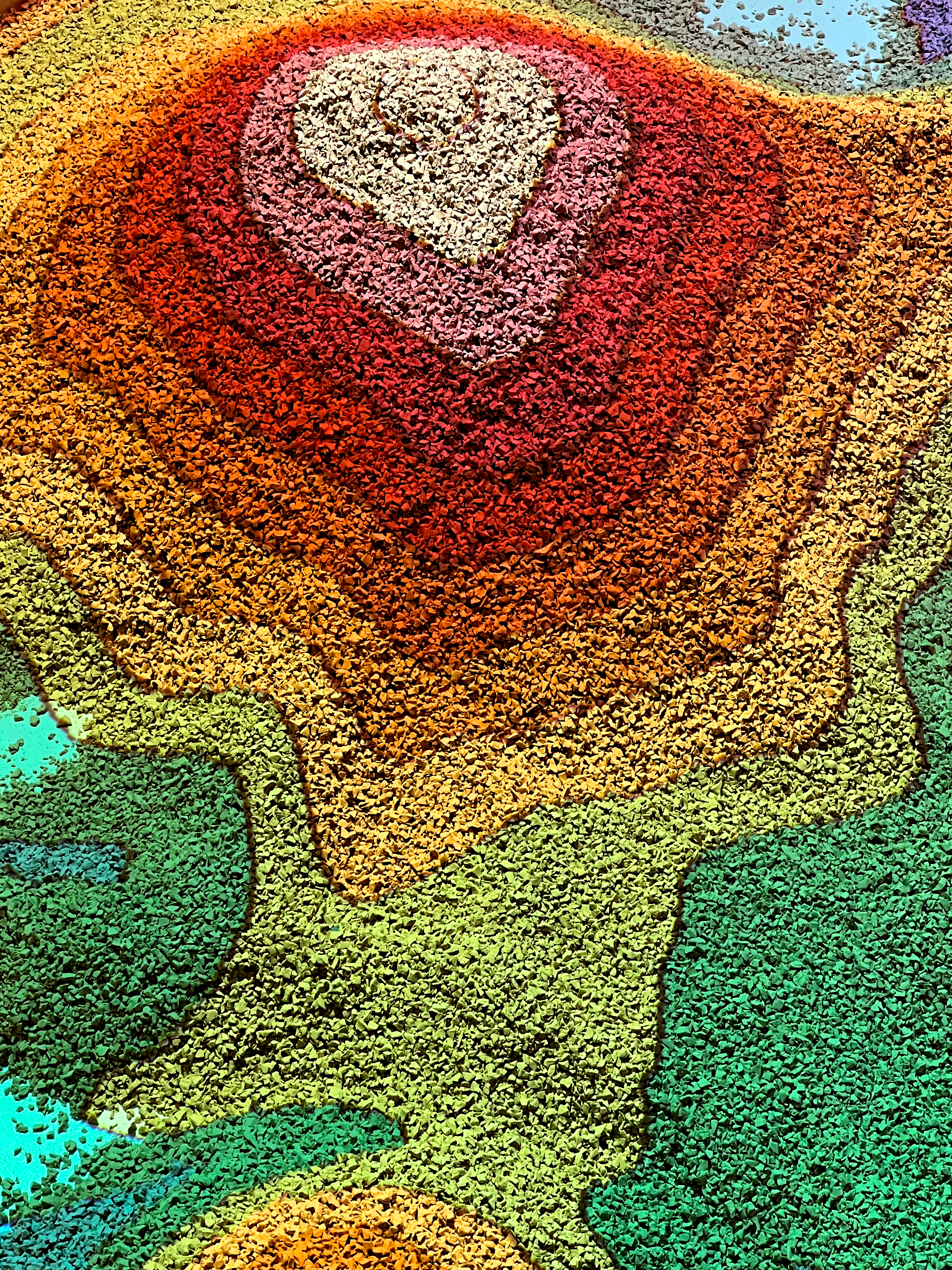 the sandbox with depth mapped projection. the highest point is white, then goes to red, orange, yellow, green, and blue as the lowest point.